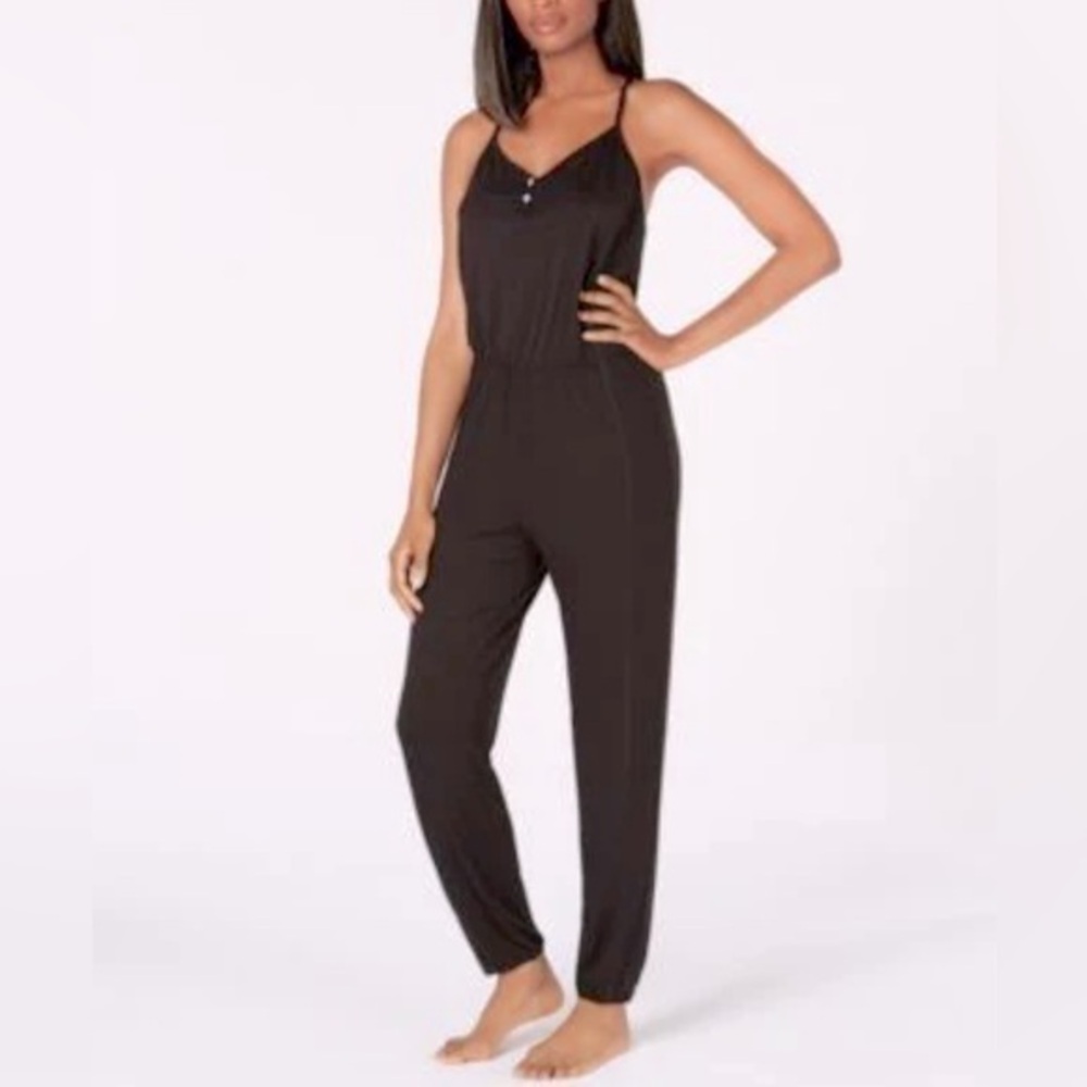 One piece black tank one piece romper. Stretch waistband. Lace detail. EEUC